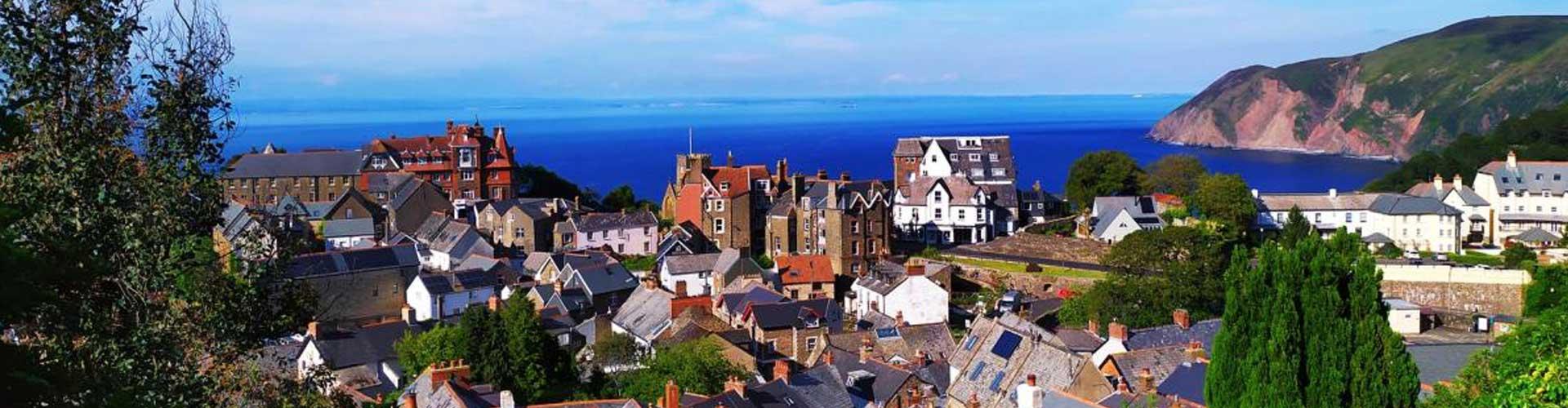 A Village with the Sea in the Background