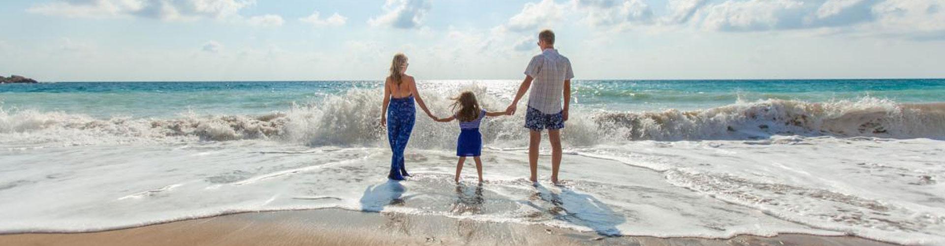 A Family Paddling in the Sea